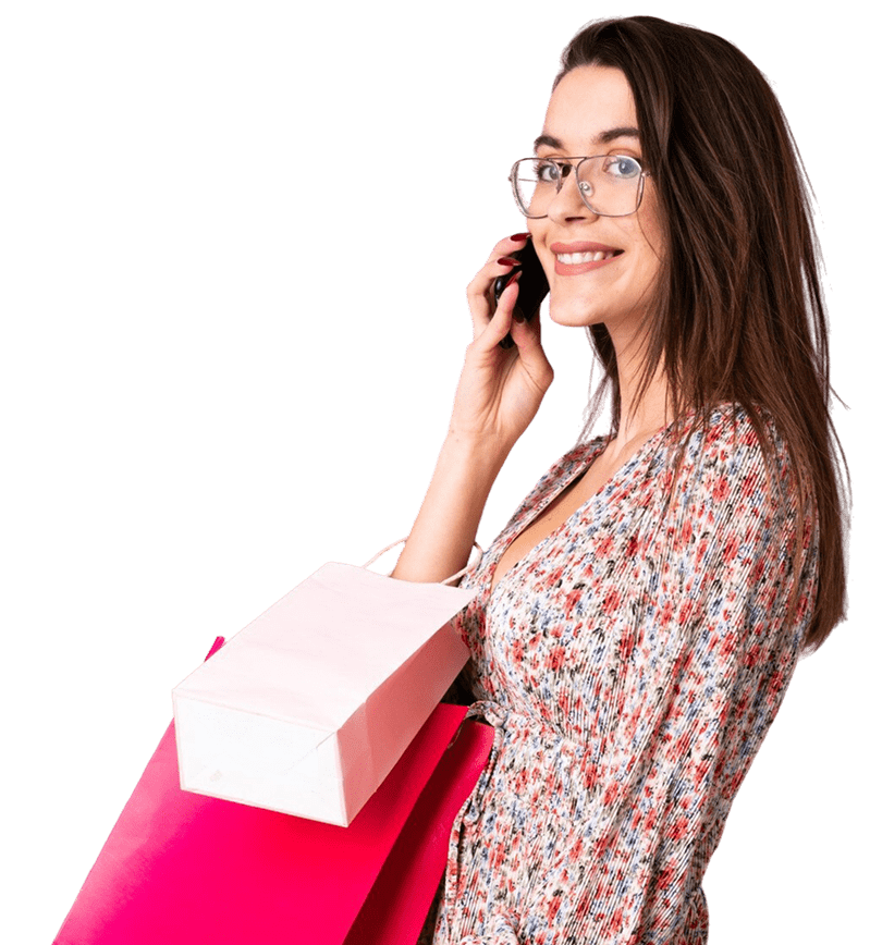 young-woman-isolated-purple-wall-holding-shopping-bags-calling-friend-with-her-cell-phone Young woman shopping with colorful bags while talking on the phone